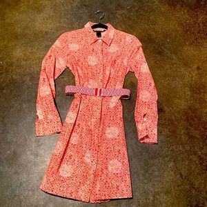 Soft red and white printed dress with matching belt.